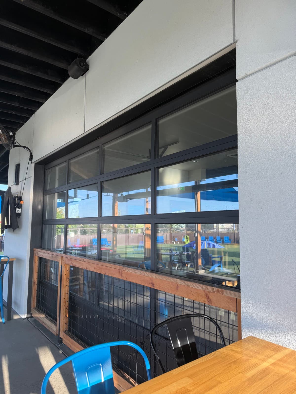 Roll-up glass patio doors at a Treasure Valley business, cleaned