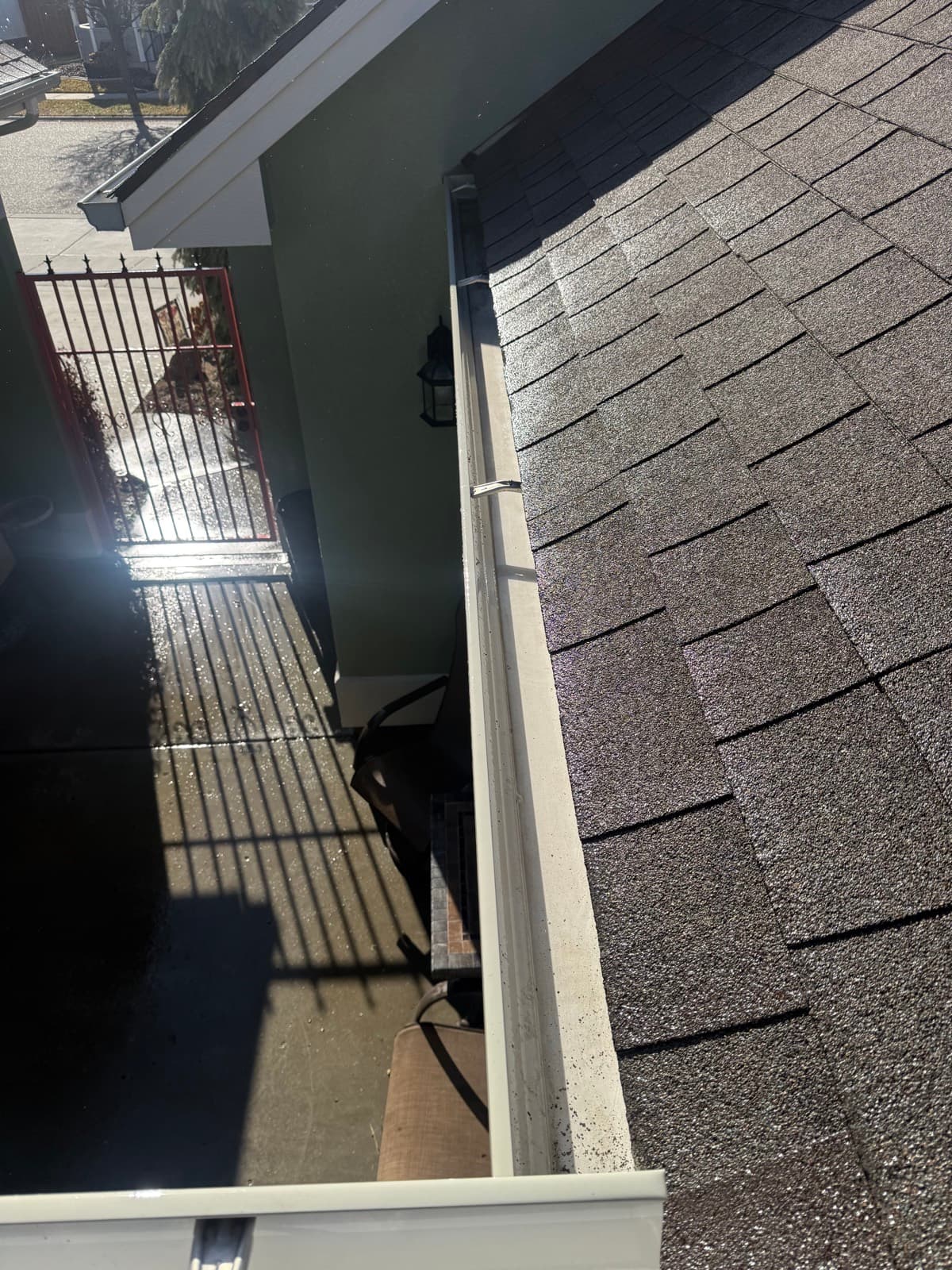 Roof valley and gutter line cleared of debris