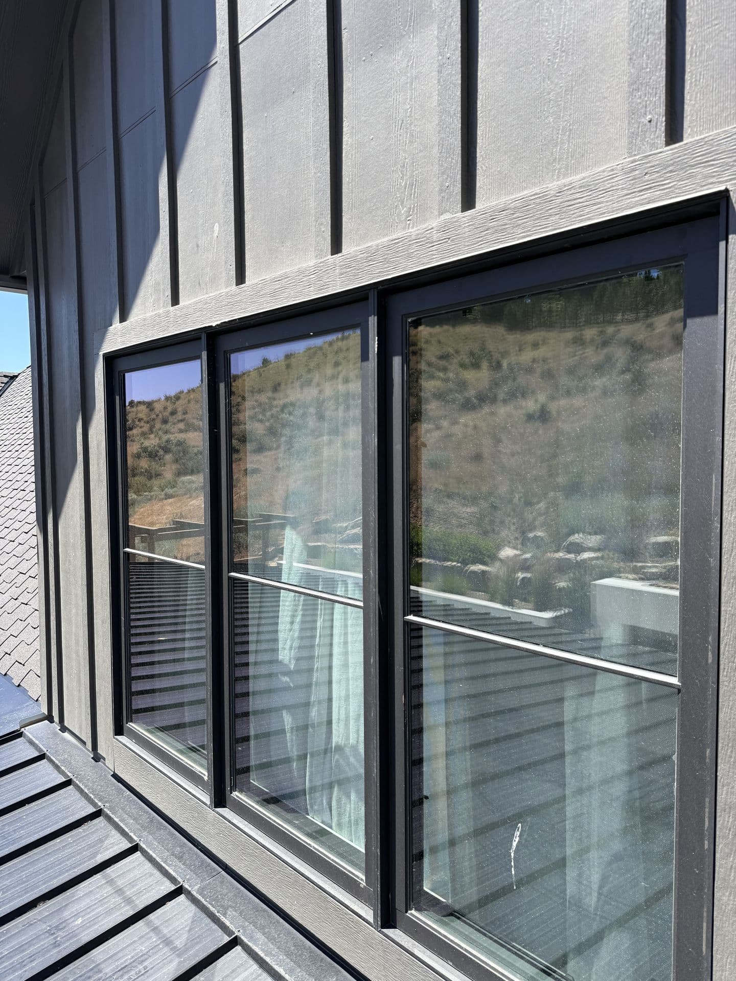 Dusty, film-covered windows before professional cleaning