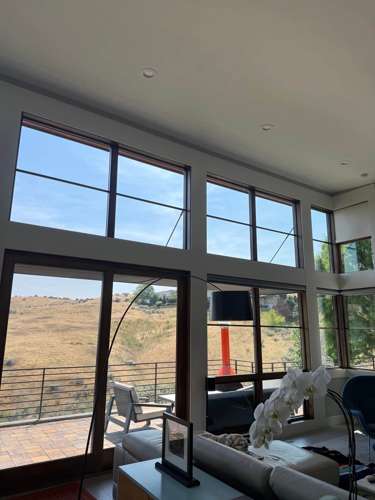 Interior windows framing the Boise foothills, cleaned spot-free